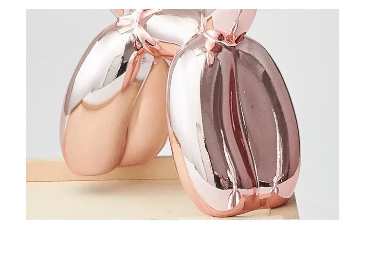 Rose gold decorative objects on a light background