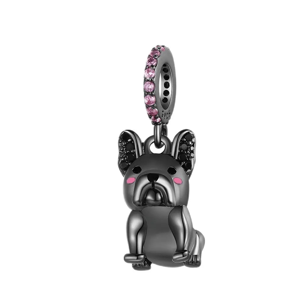 Dog-shaped charm with pink gemstones on a white background. pandora style charm pendant. Bulldog