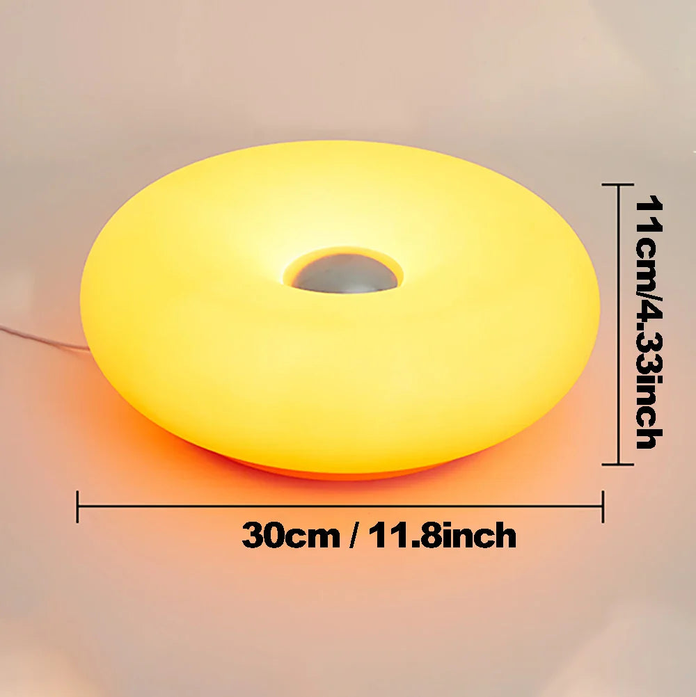 Yellow round lamp with measurements on a beige background