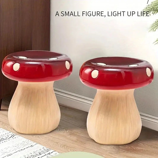 Two red and beige mushroom-shaped stools on a wooden floor with text above.