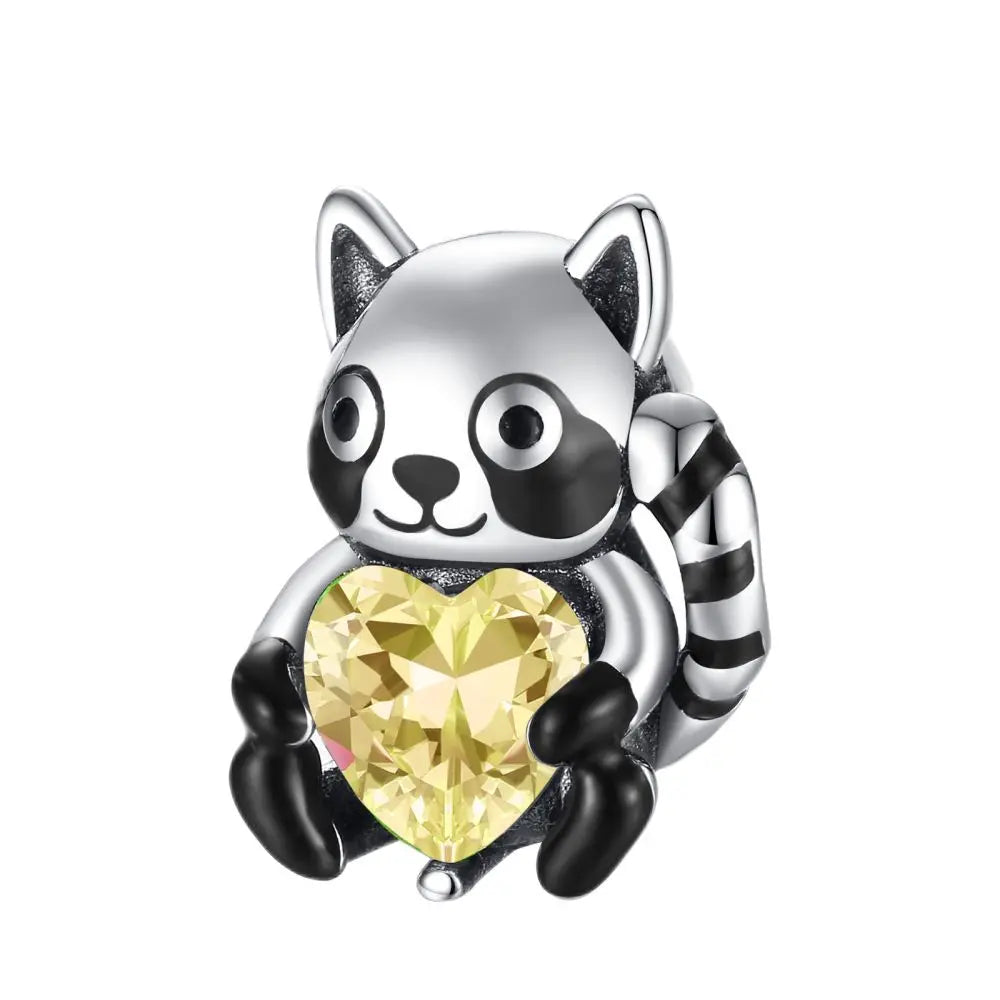Panda-shaped charm with a yellow heart on a white background. pandora style charm pendant.