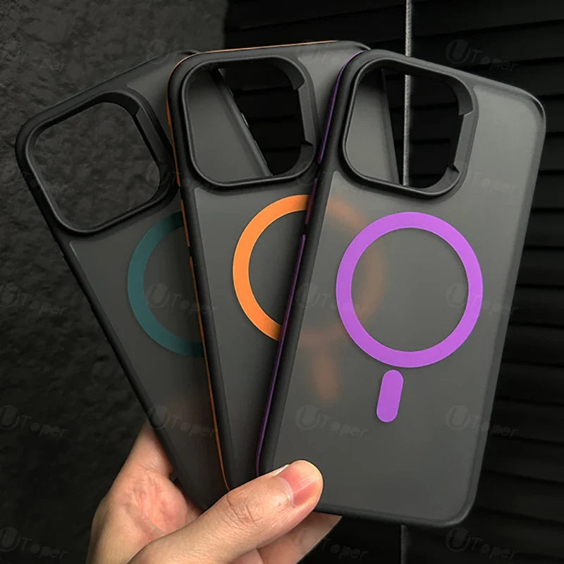 Three phone cases with colorful magnifying glass designs held by a hand against a dark background.