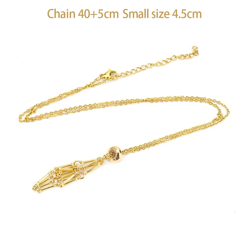 Gold necklace with a pendant on a white background