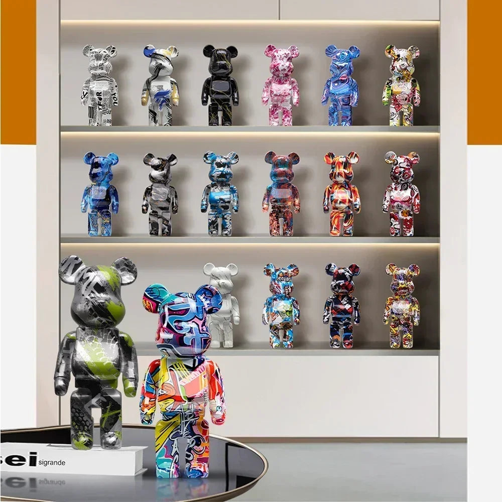 Collection of colorful bear figurines on a shelf with a white background be@rbrick collectable