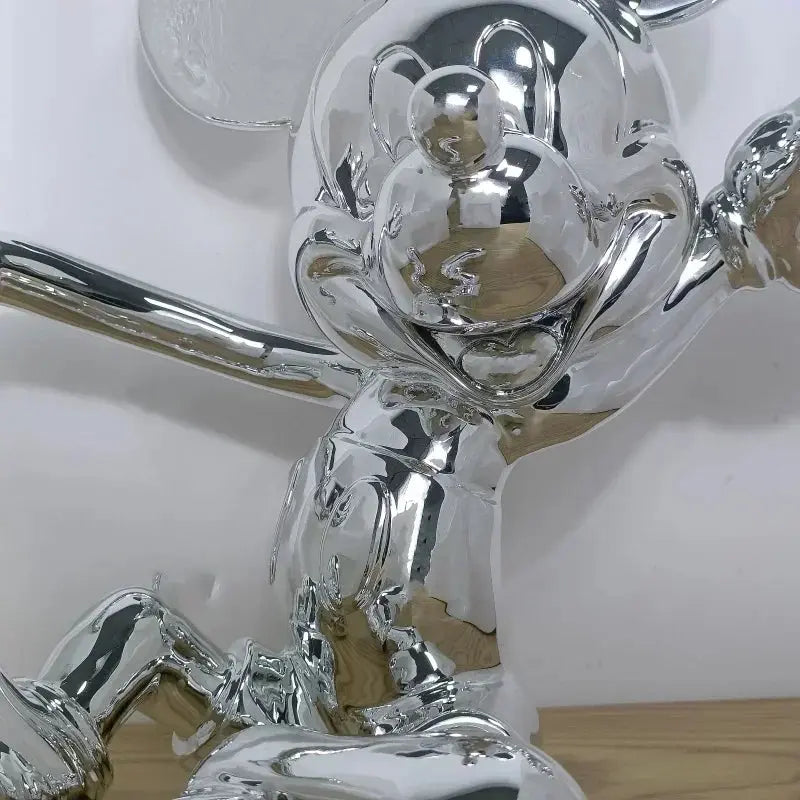 Close-up of a shiny silver trophy on a white background