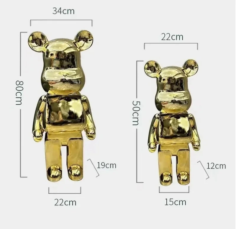 Gold bear-shaped figurines with dimensions labeled on a white background bearbrick collectable