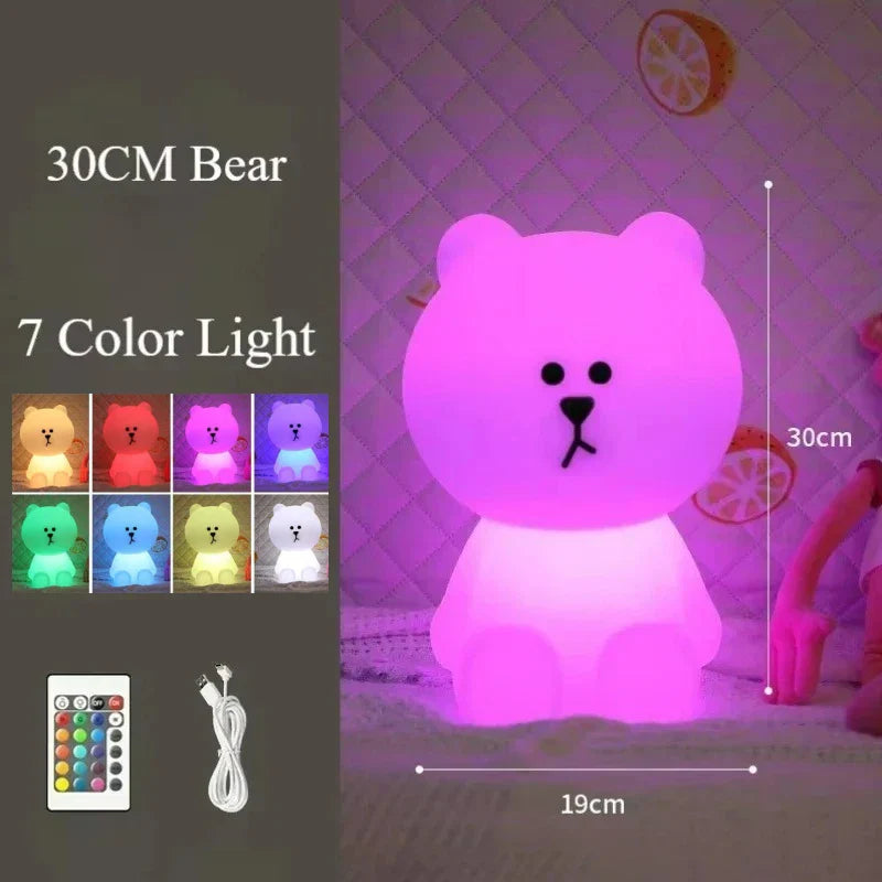 Purple bear-shaped LED lamp with 7 color options and remote control on a dark background.