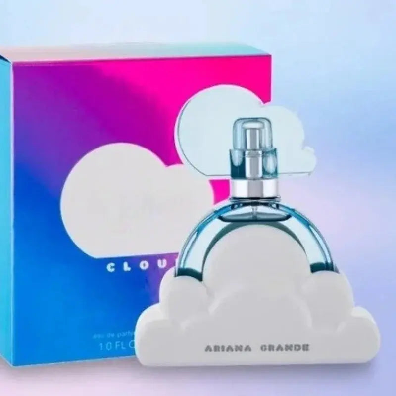 Perfume bottle and packaging with 'Cloud' by Ariana Grande on a light blue background