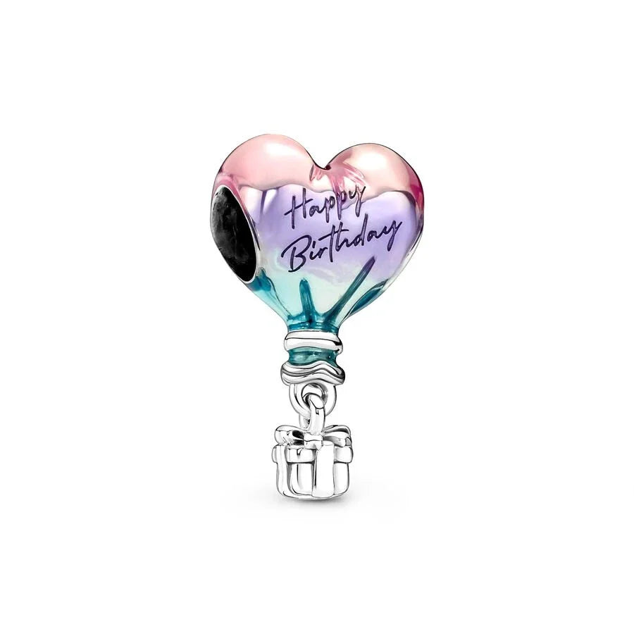Heart-shaped charm with 'Happy Birthday' text on a white background