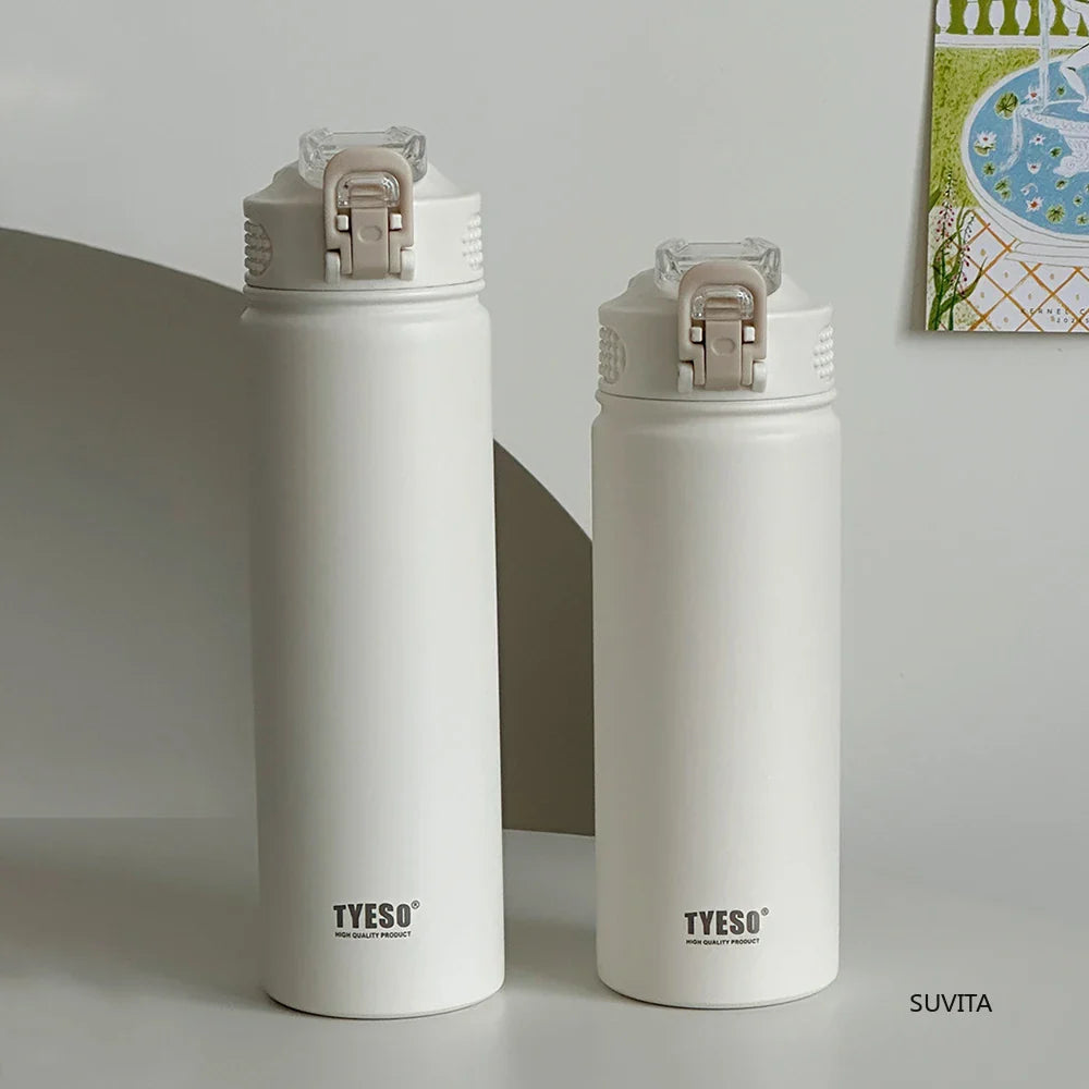 TYESO white thermos bottles in two sizes with straw lids. Leak-proof and BPA-free, perfect for home or travel use.
