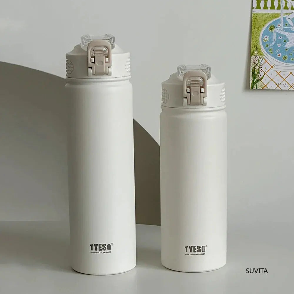 TYESO white thermos bottles in two sizes with straw lids. Leak-proof and BPA-free, perfect for home or travel use.