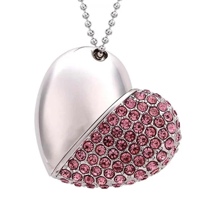 Heart-shaped pendant with pink gemstones on a white background