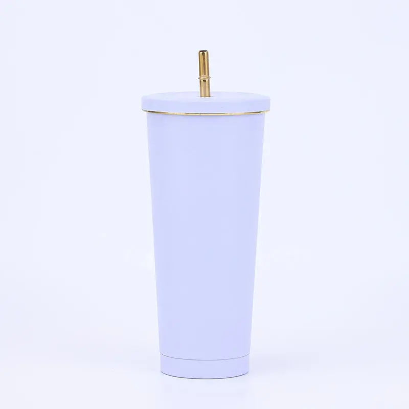 Light purple tumbler with a gold lid on a white background