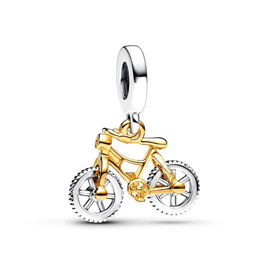 Gold and silver bicycle charm on a white background pandora style
