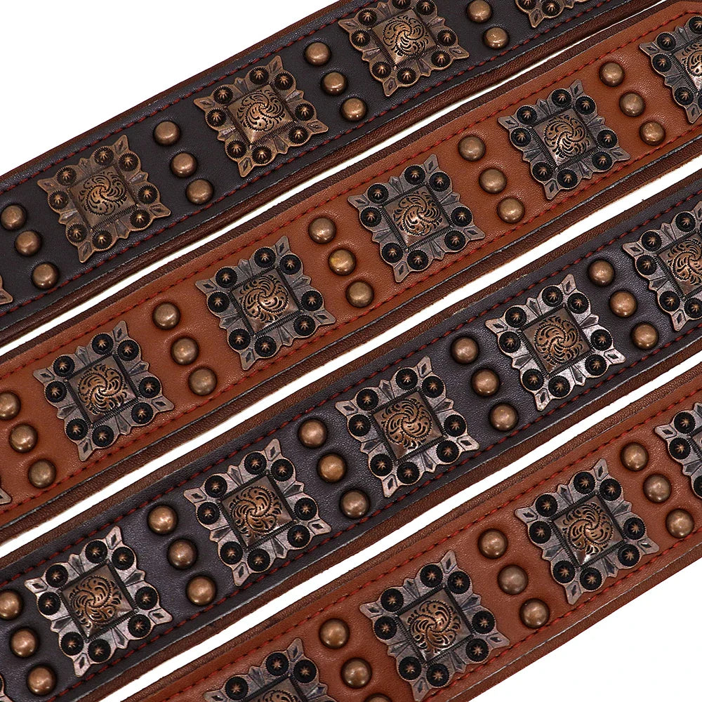 Decorative leather belts with metal studs and patterns on a white background