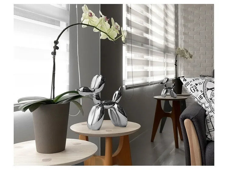 Modern living room with decorative vases and a potted plant.