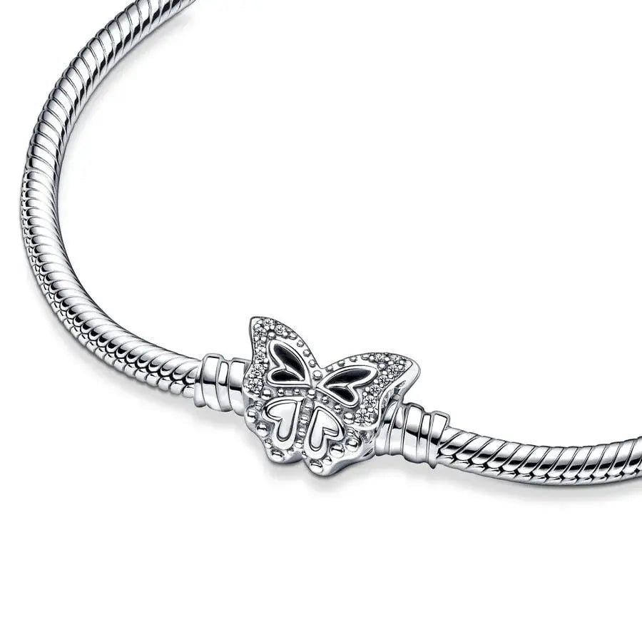 Silver bracelet with a butterfly charm on a white background