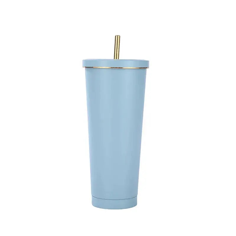 Light blue tumbler with a gold straw on a white background