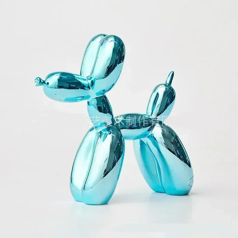 Blue metallic balloon dog sculpture on a white background