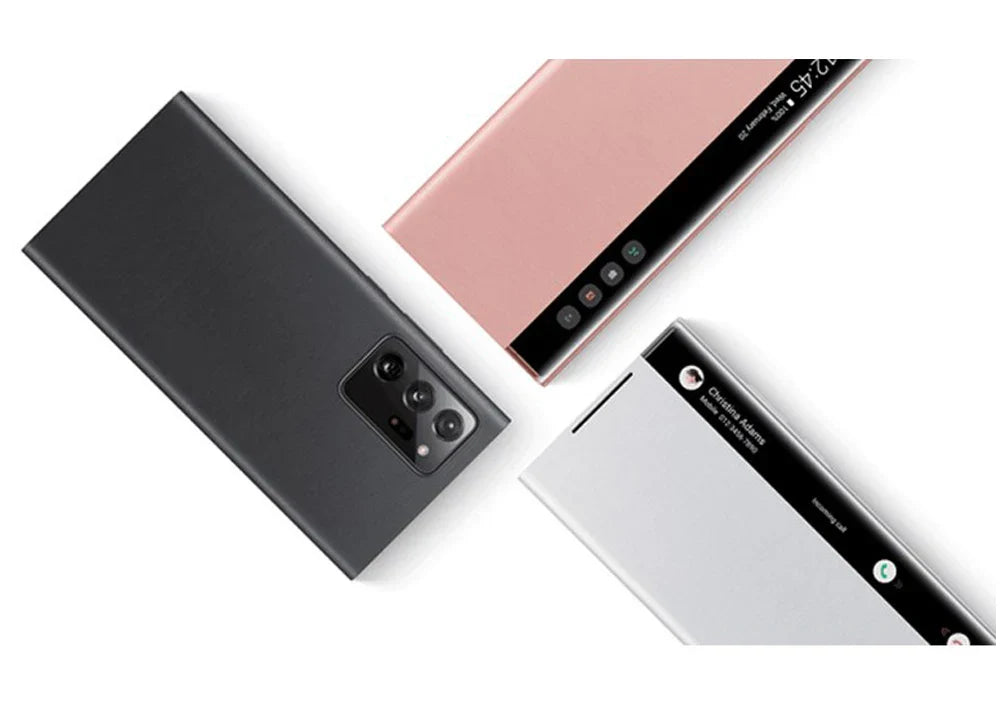 Three smartphones in black, rose gold, and silver on a white background