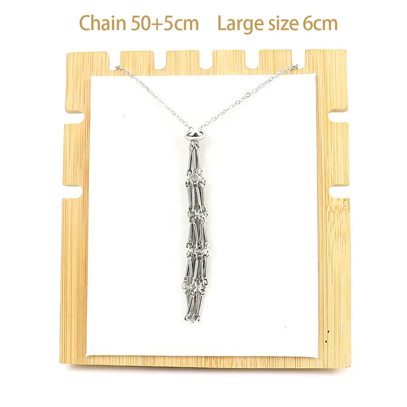 Silver necklace with a large pendant on a wooden stand, with text indicating chain length and pendant size.