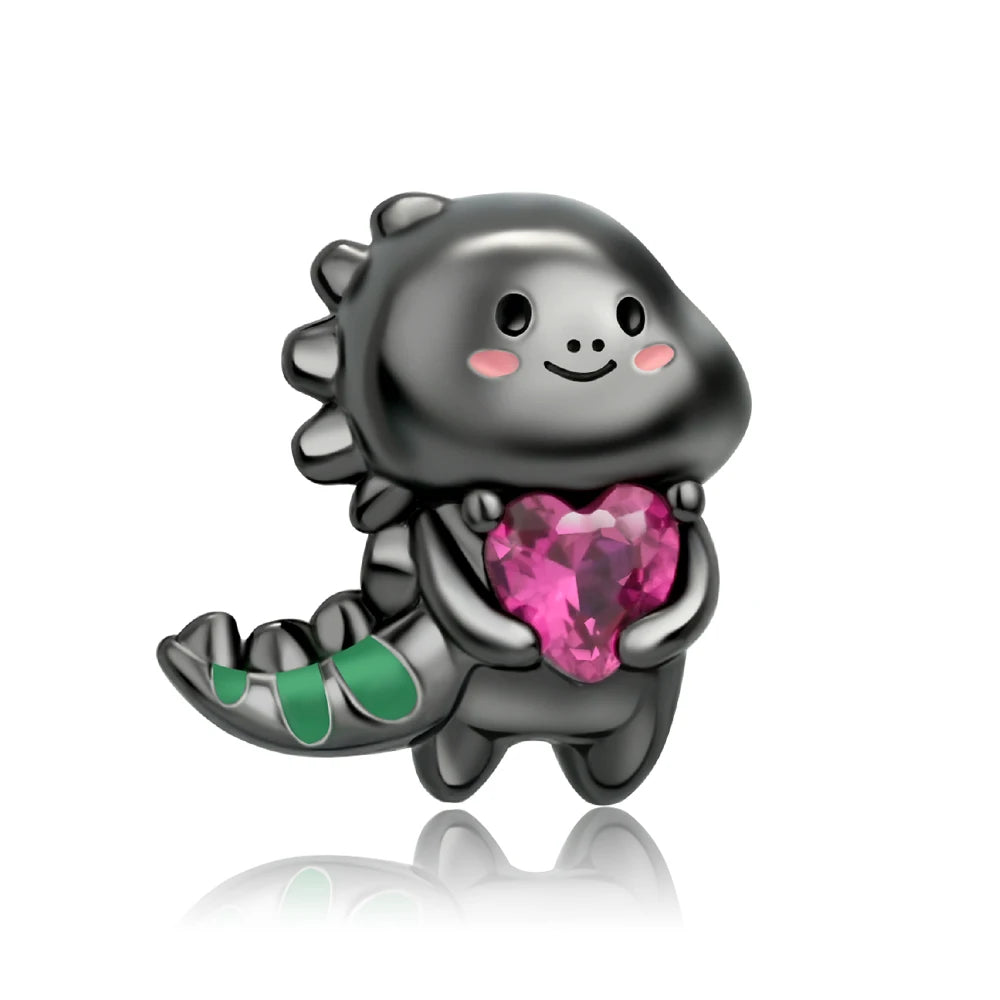 Black and green axolotl charm with a pink heart on a white background pandora style charm pendant. Gothic style, halloween theme