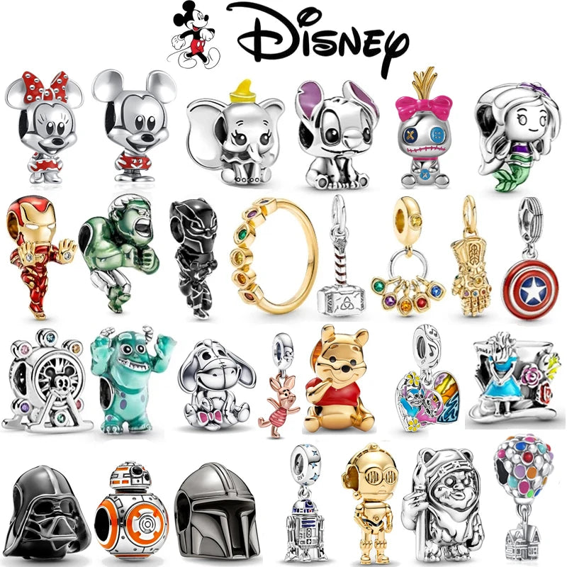 Collection of Disney-themed charms on a white background
