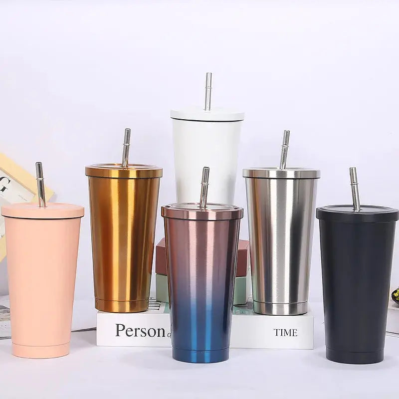 Set of colorful tumblers with straws on a white background