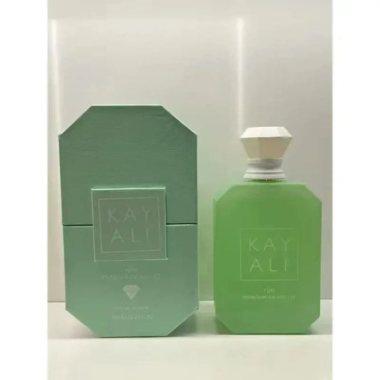 Green perfume bottle and packaging with 'KAY ALI' branding on a white background