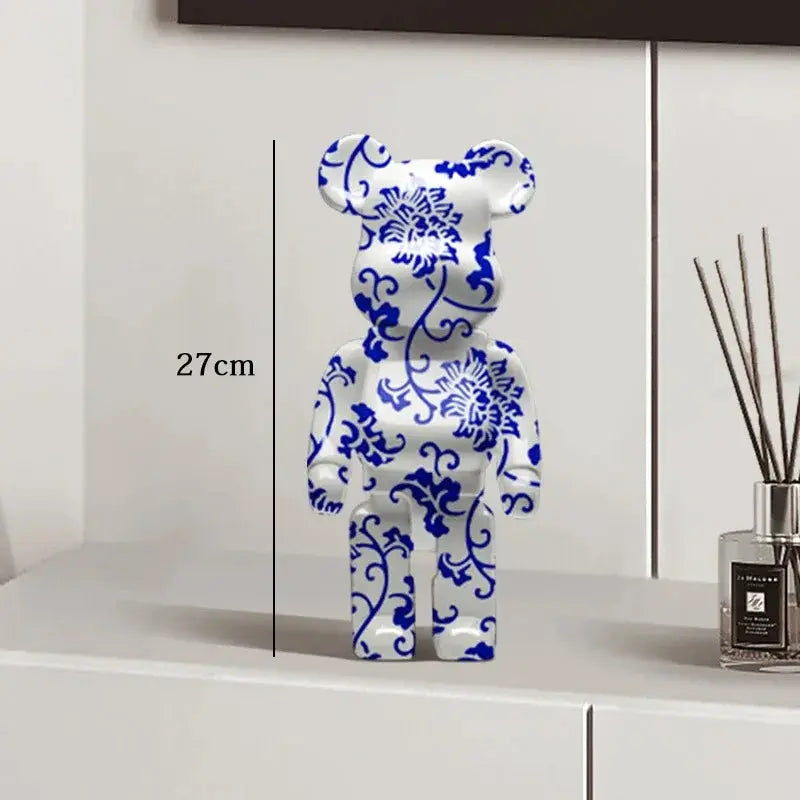 Decorative vase with blue floral patterns on a white surface, with a measurement label indicating its height. be@rbrick collectable