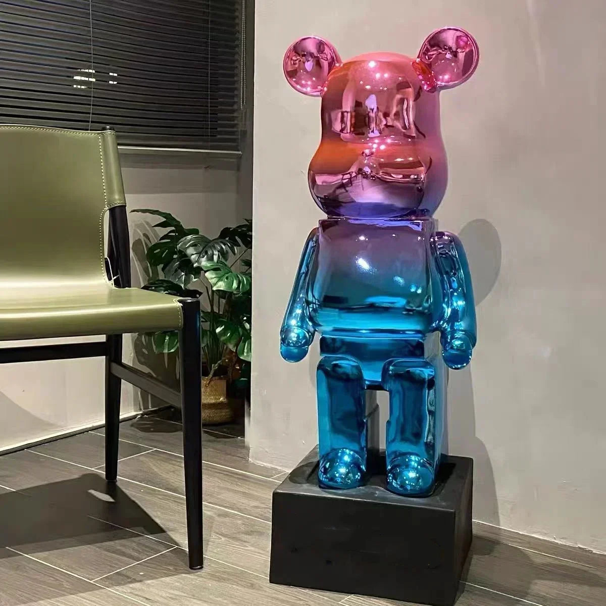 Colorful bear-like sculpture on a pedestal in an indoor setting bearbrick collectable