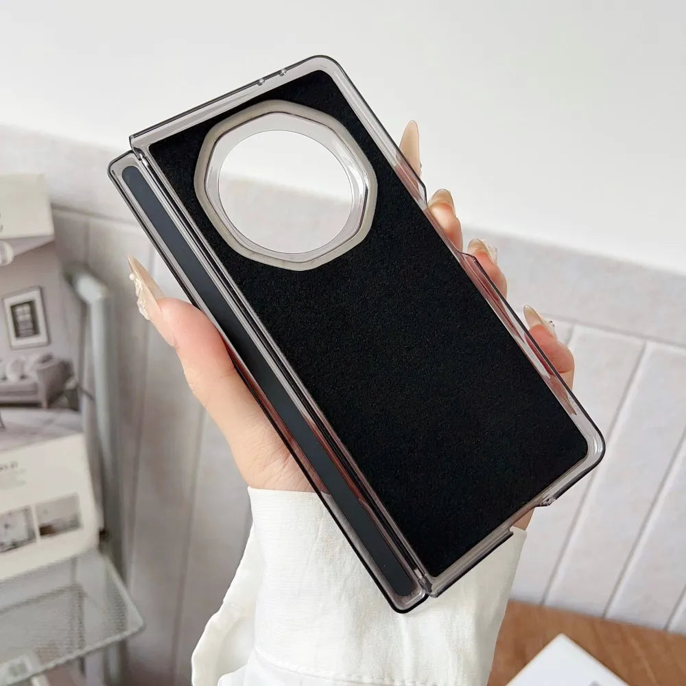 Person holding a phone case with a reflective surface