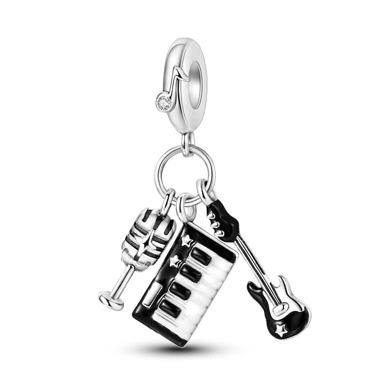 Silver charm with a microphone, piano keys, pandora style charm pendant. Gothic style, halloween theme. Muscian, singer, keyboard, guitarist