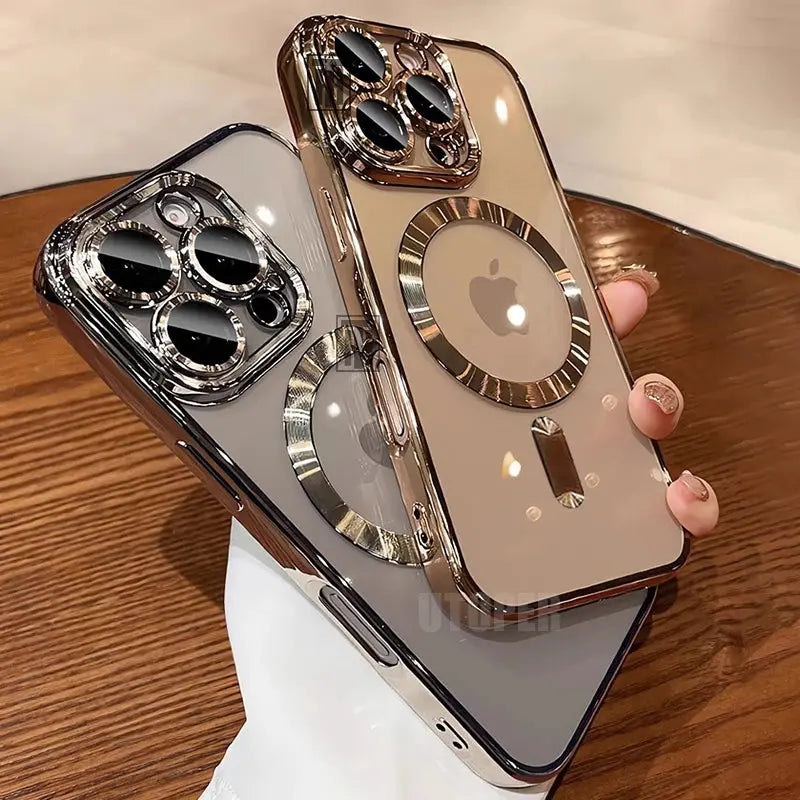 Smartphone with a reflective case held by a hand on a wooden surface