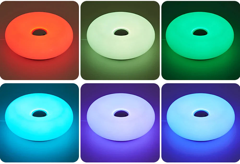 Six circular objects in different colors on a grid