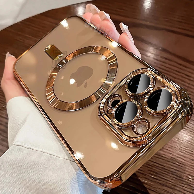 Gold phone case with reflective surface held by a hand on a wooden surface