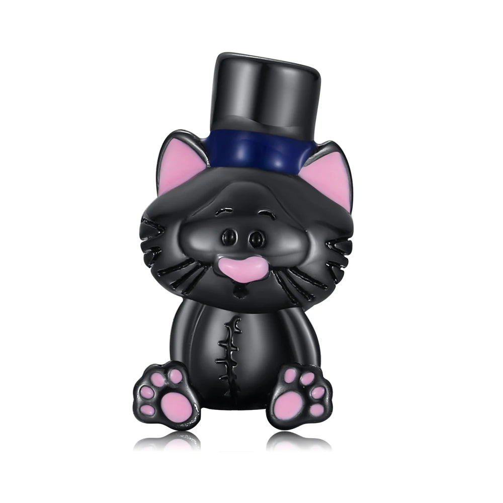 Black cat-shaped figurine with pink paws and a blue bow tie on a white background. pandora style charm pendant. Halloween theme