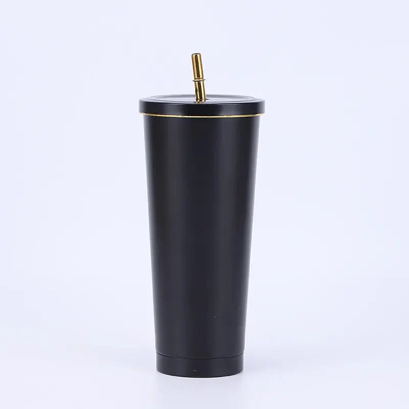 Black tumbler with a gold lid on a white background