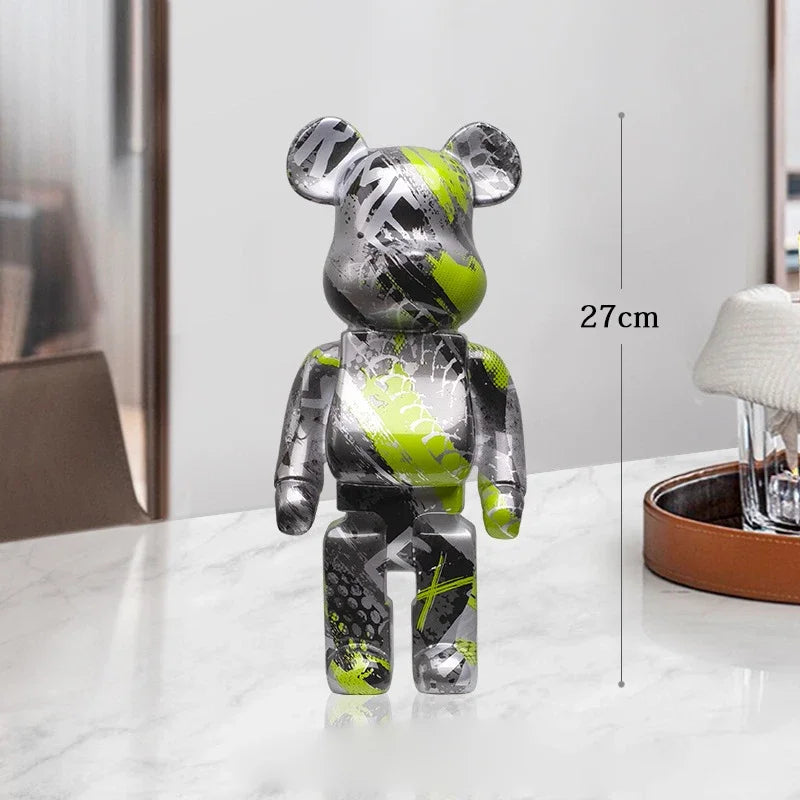 Clear and green bear-like figurine on a white surface with dimensions indicated. be@rbrick collectable