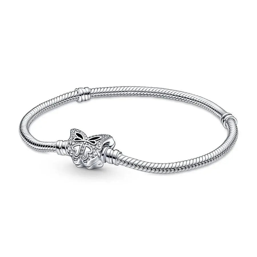 Silver bracelet with a butterfly charm on a white background