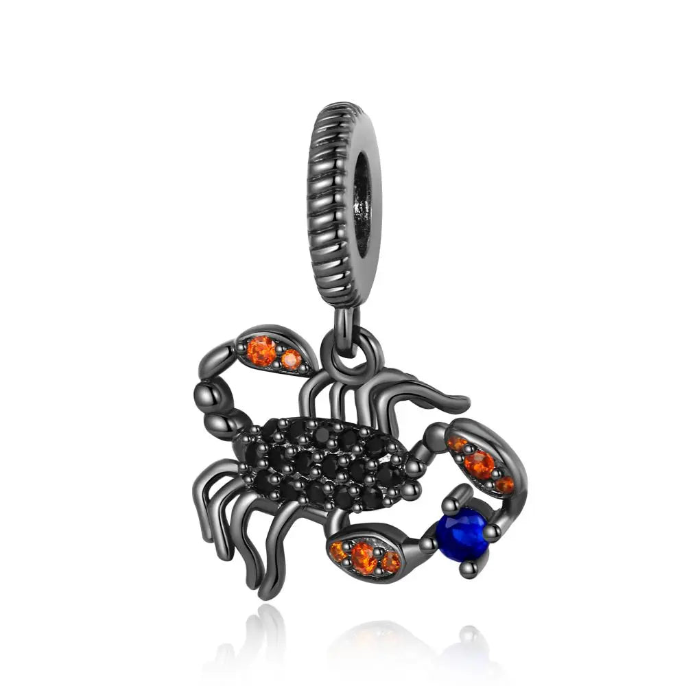 Scorpion-shaped charm with colored stones on a white background. pandora style charm pendant. Gothic style, halloween theme