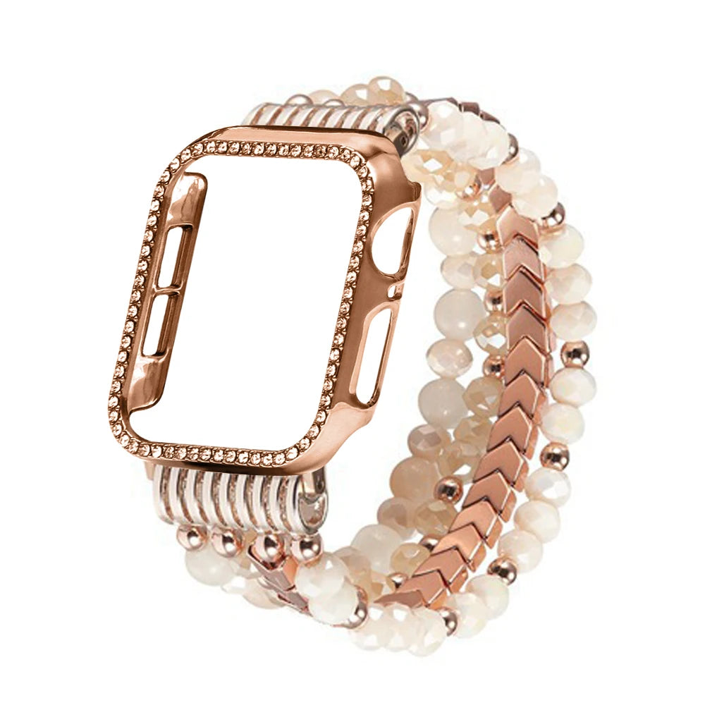 Rose gold watch case with beaded bracelet on a white background