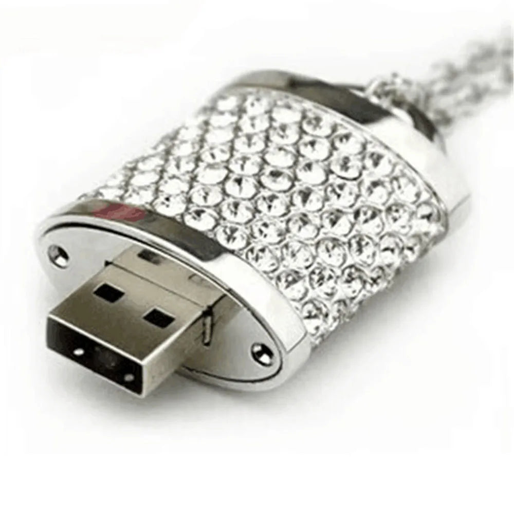 USB flash drive with rhinestone embellishments on a white background