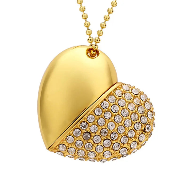 Gold heart-shaped pendant with crystal embellishments on a white background