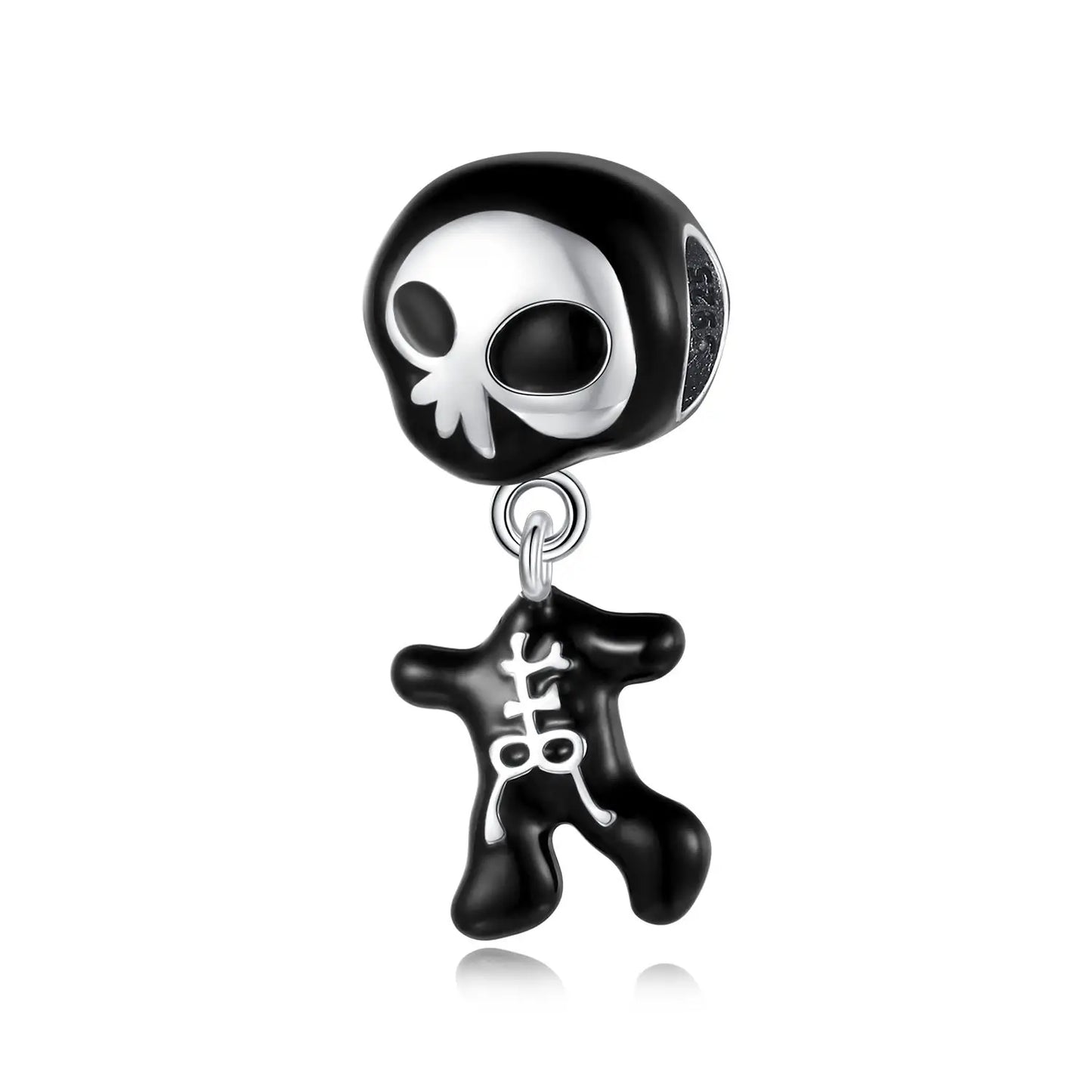 Black and white skull-shaped charm on a white background. pandora style charm pendant. Halloween, gothic. skull and bones