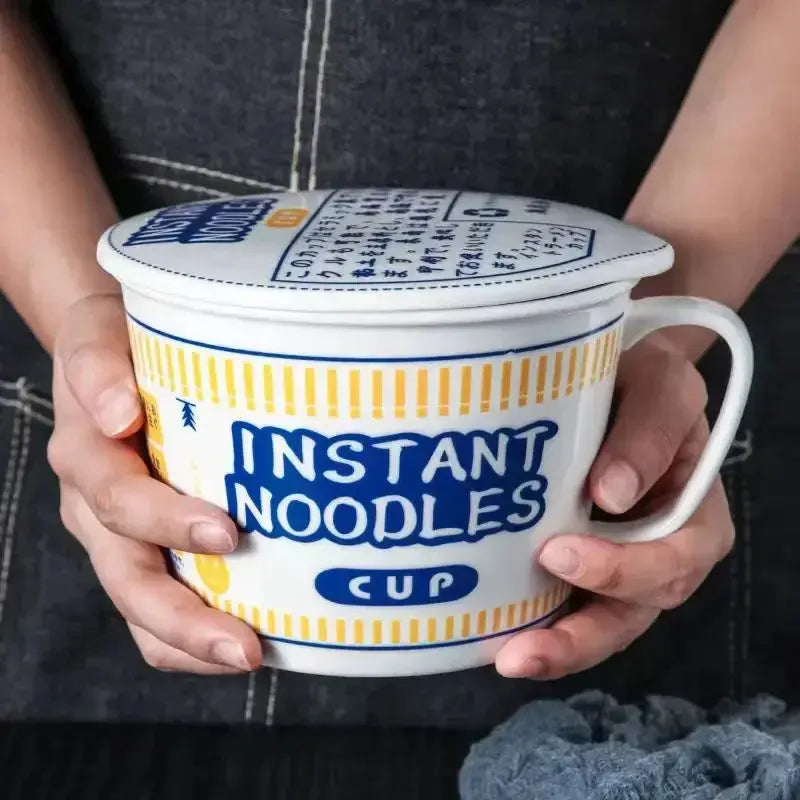 Person holding large blue ceramic noodle bowl with lid. Durable and ideal for instant noodles, soups, and stews.