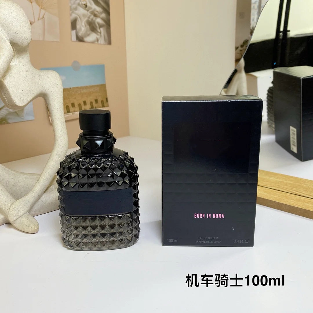 Valentino Perfume bottle and packaging on a surface with decorative items in the background