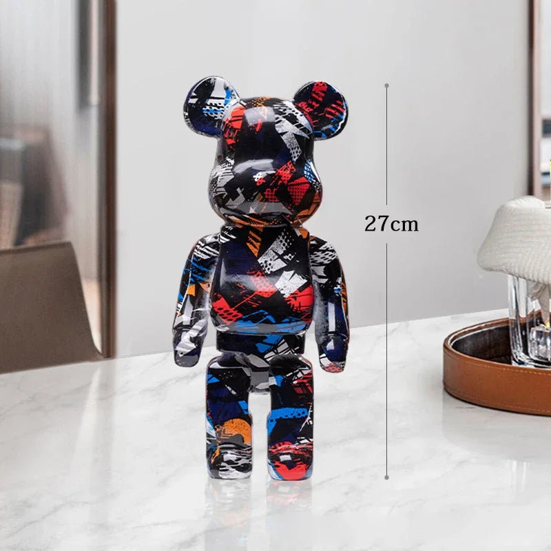 Colorful bear-shaped figurine on a white surface with a measurement label indicating its height. be@rbrick collectable be@rbrick collectable