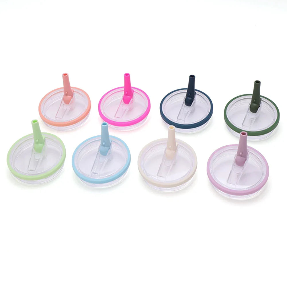 Eight colorful flip straw lids with spouts arranged in rows, reusable 40 oz tumbler lid replacements for Stanley Quencher