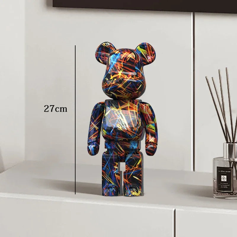 Colorful bear-shaped figure on a white surface with measurement be@rbrick collectable